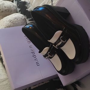 These are Steve Madden platform black and white shoes size 8